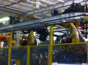 Robotic arms welding a new MV-1.